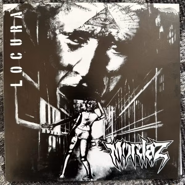 MORDAZ Locura (Blue vinyl) (MG - Colombia original) (EX) 7"