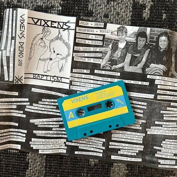 VIXENS Baptism / Vixens Demo 2011 (La Vida Es Un Mus – UK repress) (EX) TAPE