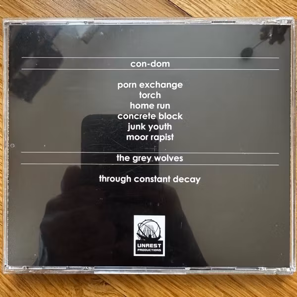 CON-DOM / THE GREY WOLVES Waging War Against You (Unrest - UK reissue) (NM) CD