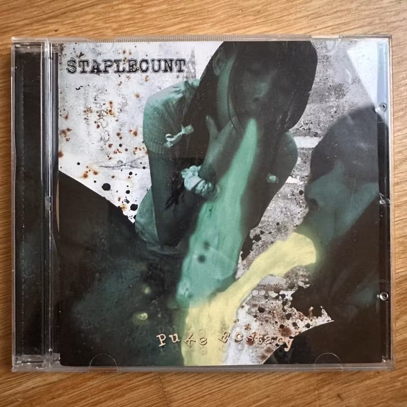 STAPLECUNT Puke Ecstasy (Obsessive Fundamental Realism – Germany original) (NM) CD