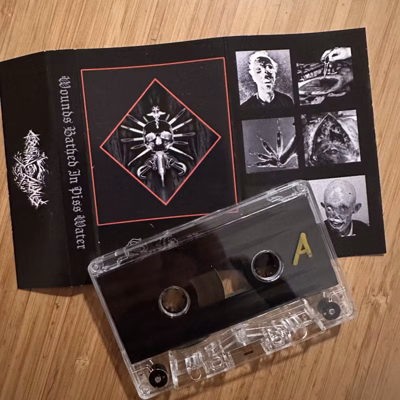STEEL HOOK PROSTHESES Wounds Bathed In Piss Water (Desolation Galaxies - Germany reissue) (NM) TAPE