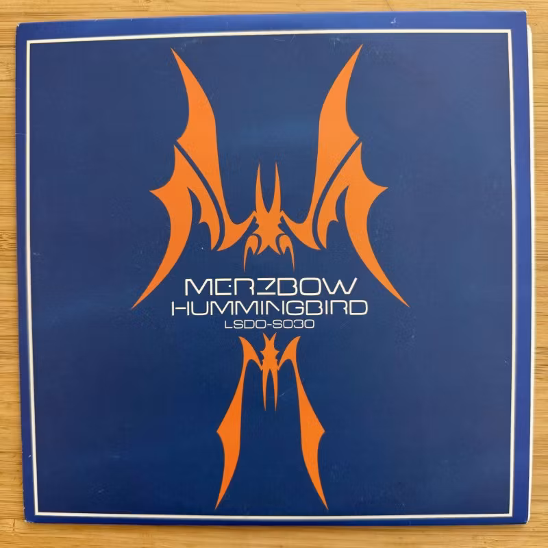 MERZBOW Hummingbird (Purple vinyl) (L.S.D. Organisation – USA original) (EX) 7"