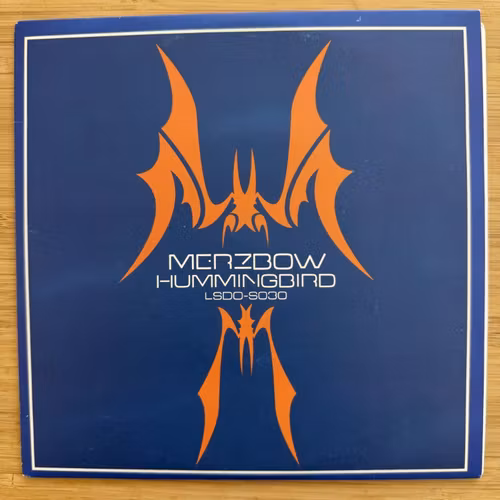 MERZBOW Hummingbird (Purple vinyl) (L.S.D. Organisation – USA original) (EX) 7"