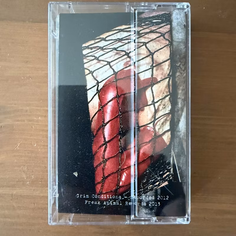 MANIA Grim Conditions (Freak Animal - Finland repress) (NM) TAPE