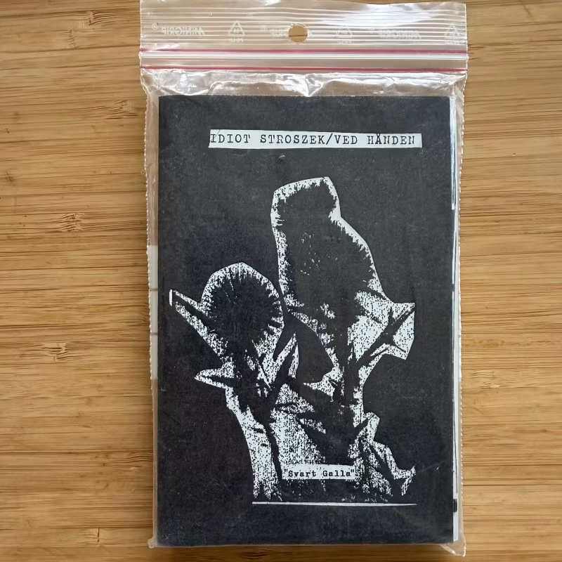 IDIOT STROSZEK / VED HÅNDEN Svart Galla (Hatets Dok - Sweden original) (NM) TAPE