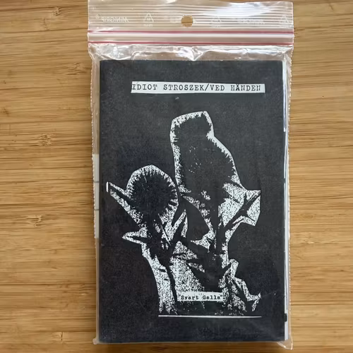IDIOT STROSZEK / VED HÅNDEN Svart Galla (Hatets Dok - Sweden original) (NM) TAPE