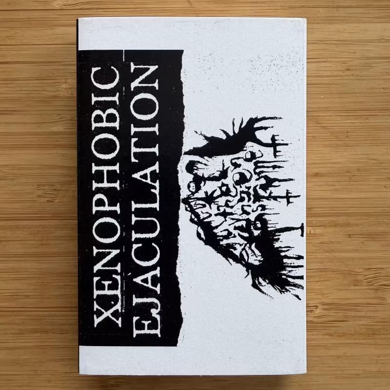 XENOPHOBIC EJACULATION / REEK OF THE UNZEN GAS FUMES Split (Humanicidal Harmonies - USA reissue) (NM) TAPE