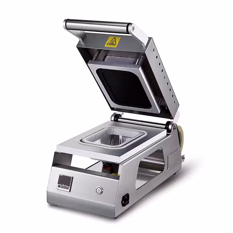 Unipac S110 förpackningsmaskin för matlådor och Duniform plasttråg