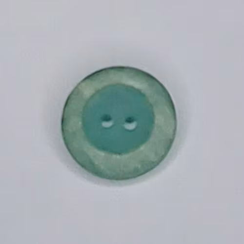 Ljusblå knapp 17 mm