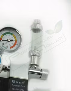 Bubbelräknare/backventil för montage i regulatorn