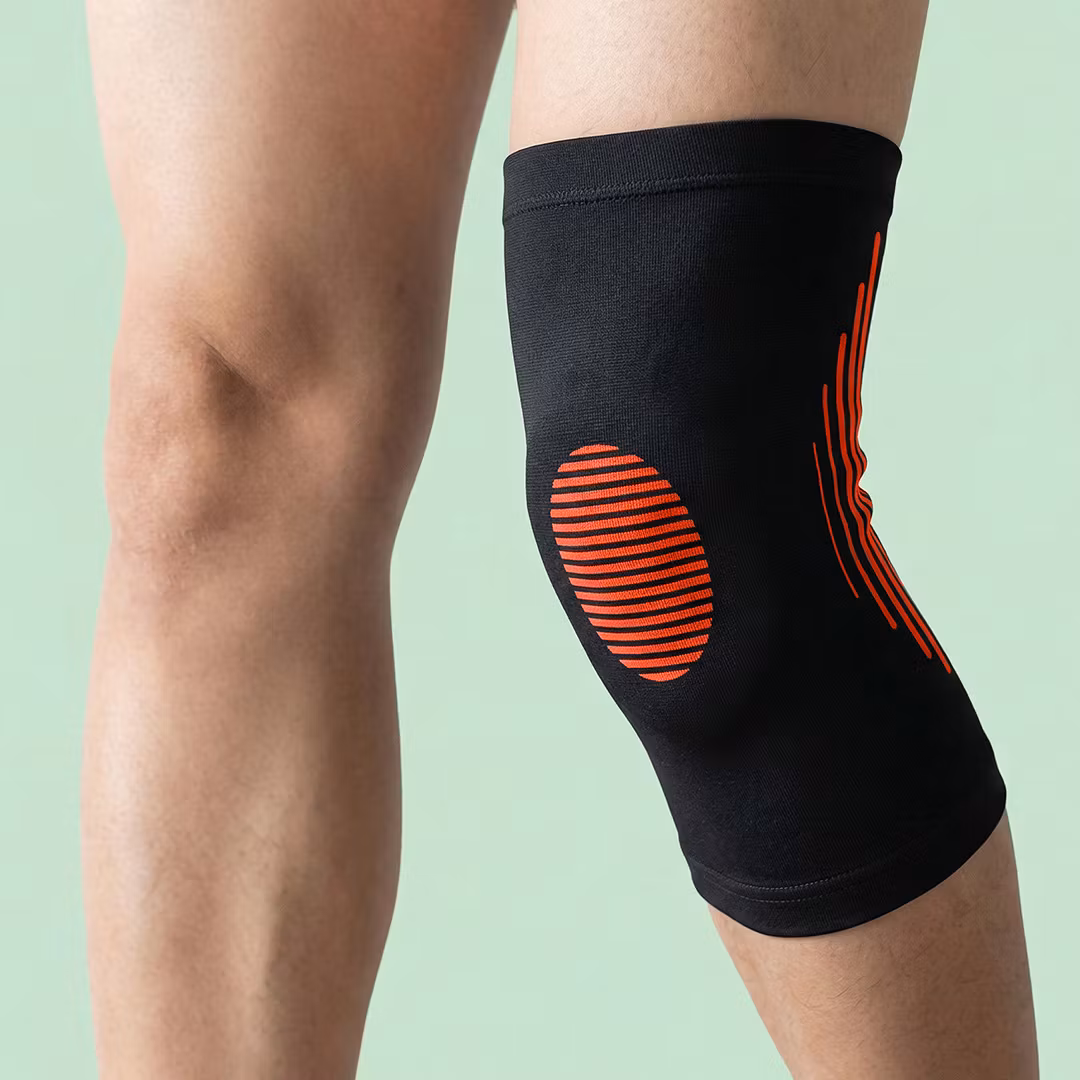 Knestøtte elastisk (oransje)