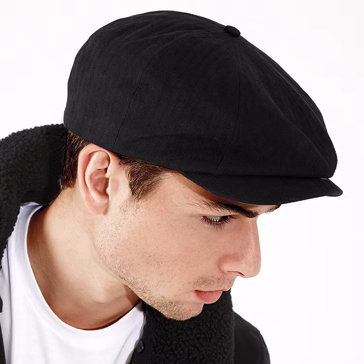 Svart newsboy keps