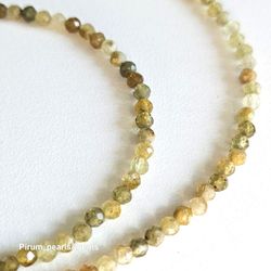 Halsband med fasettslipad grossular granat 2 mm
