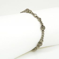 Armband med fasettslipad pyrit 4,6 och 8 mm på resår