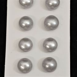 Silvergrå buttonformade pärlor 8-8,5 mm.