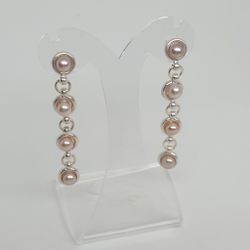 Örhängen med rosa pärlor på silver