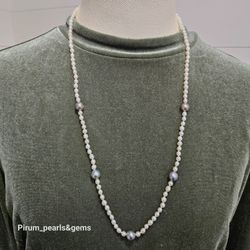 Halsband med stora tahitipärlor och vita akoya och sötvattenpärlor