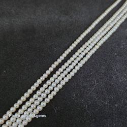 Små runda vita pärlor 2,5-3 mm