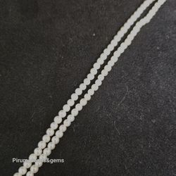 Små vita runda pärlor 2,8-3 mm