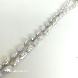 Silvergrå fantastiska pärlor 7x10 mm