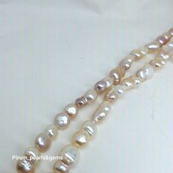 Dubbelpärlor naturfärgade 10x14 mm