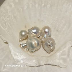 Paket med vita barocka pärlor 15x20 mm, små skönhetsfel