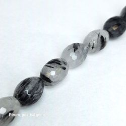 Rutilkvarts ovalslipade med fasetter 10x13 mm