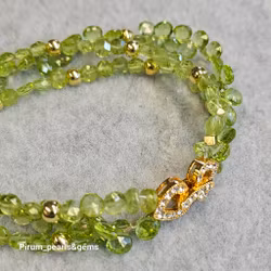 Armband med fasettslipade peridot stenar