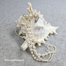 Långt halsband med vita japanska saltvattenpärlor 3-8,5 mm