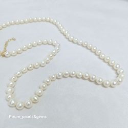 Halsband med vita runda pärlor 6,5 mm, extra långt