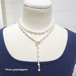Halsband långt, med vita japanska saltvattenpärlor 5 och 7,5 mm