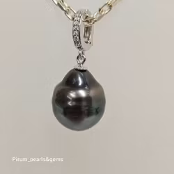 Stor mörk tahiti pärla på öppningsbar silverögla