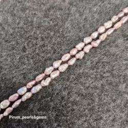 Rosafärgade risgrynspärlor 4x12 mm