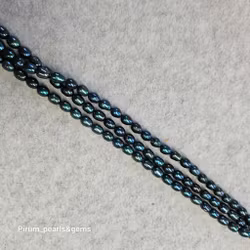 Blå-gröna petrolfärgade pärlor 5,5-6 mm