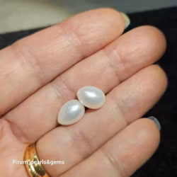 Vita droppformade pärlor i par 8,5-9 x 11 mm