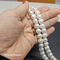 Vita semi-runda pärlor 10-11 mm