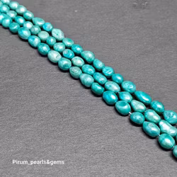 Mörkt turkosa pärlor 8x10 mm