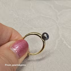 Förgylld silverring med grön odlad pärla