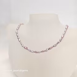 Halsband med rosa avlånga pärlor 6x10 mm