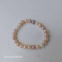 Armband med rosa naturfärgade pärlor