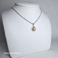 Rosa mindre barockpärla på silverögla