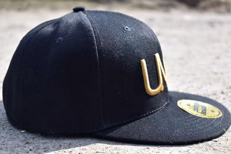 Snapback Keps, UMP guld