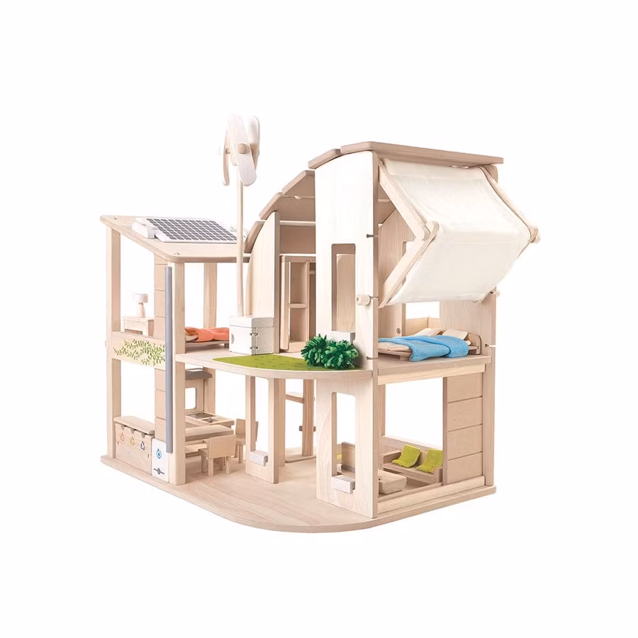 Green dollhouse with furniture