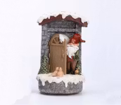 Tomten tittar ut speldosa