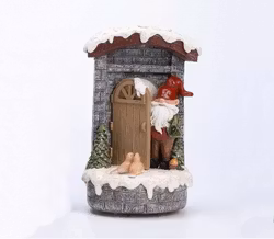 Tomten tittar ut speldosa