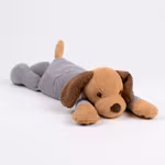 Tyngdhund i pyjamas med säng