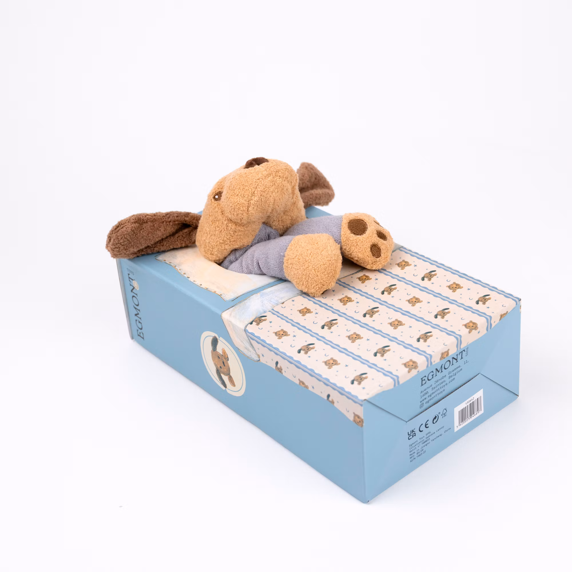 Tyngdhund i pyjamas med säng