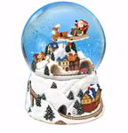 Glob Tomte åker släde