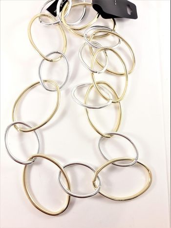 Halsband med stora ringar silver- och guldfärg