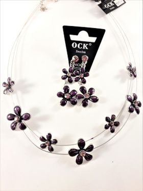 Halsband med lila blommor samt matchande örhängen